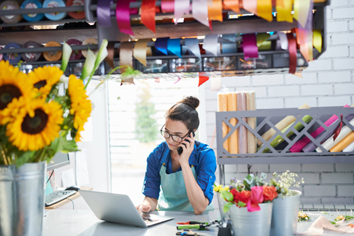 young businesswoman in flower shop
